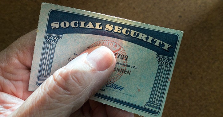 hand-holding-social-security-card